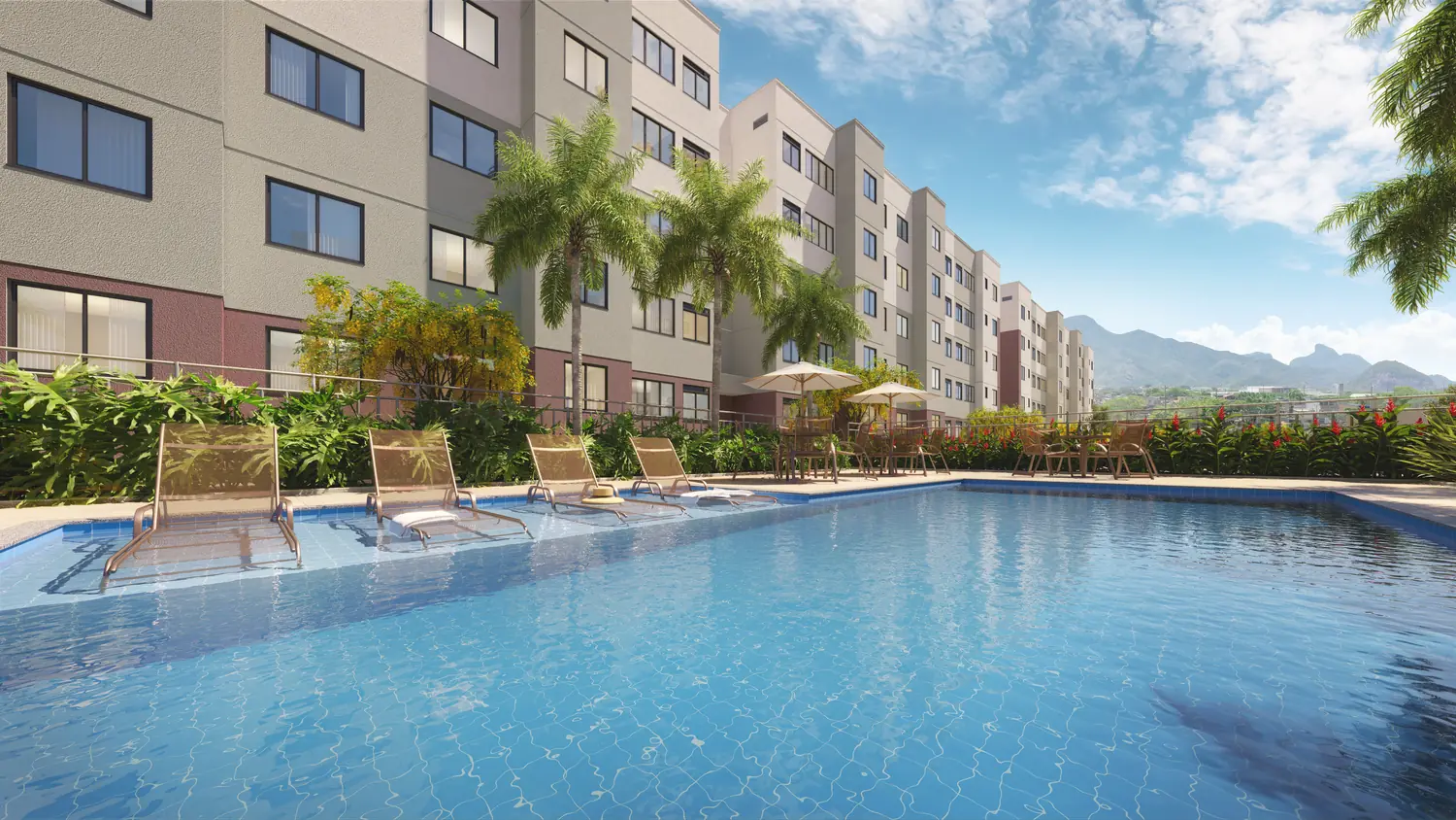 Piscina adulto com deck molhado no Inn Barra Olímpica
