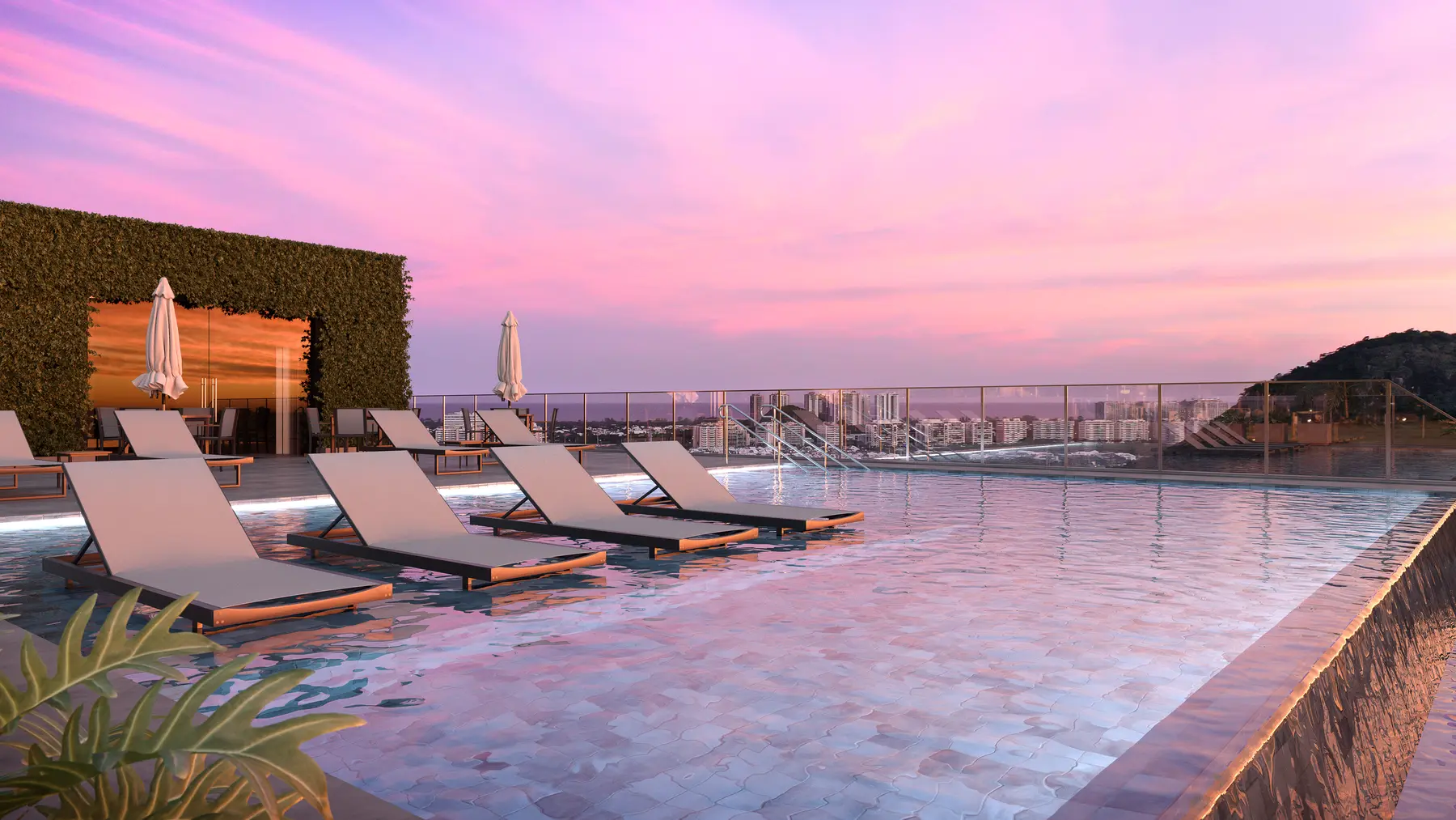 Piscina do rooftop do Etehe Residencial ao entardecer