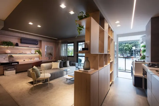 Sala de estar — Atmosfera Condominium Park · Decorado de 3 quartos