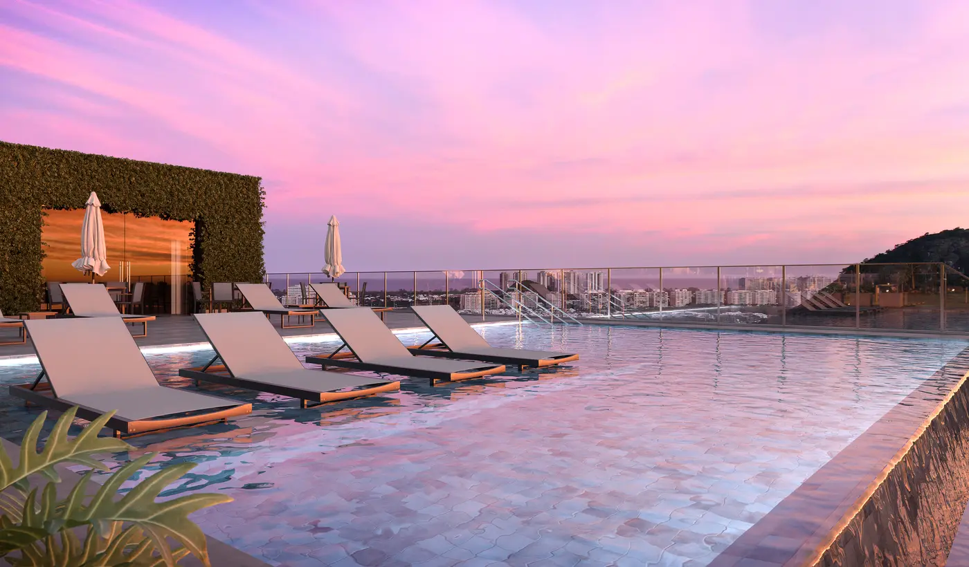 Piscina de borda infinita no rooftop do Etehe Residencial, na Barra Olímpica