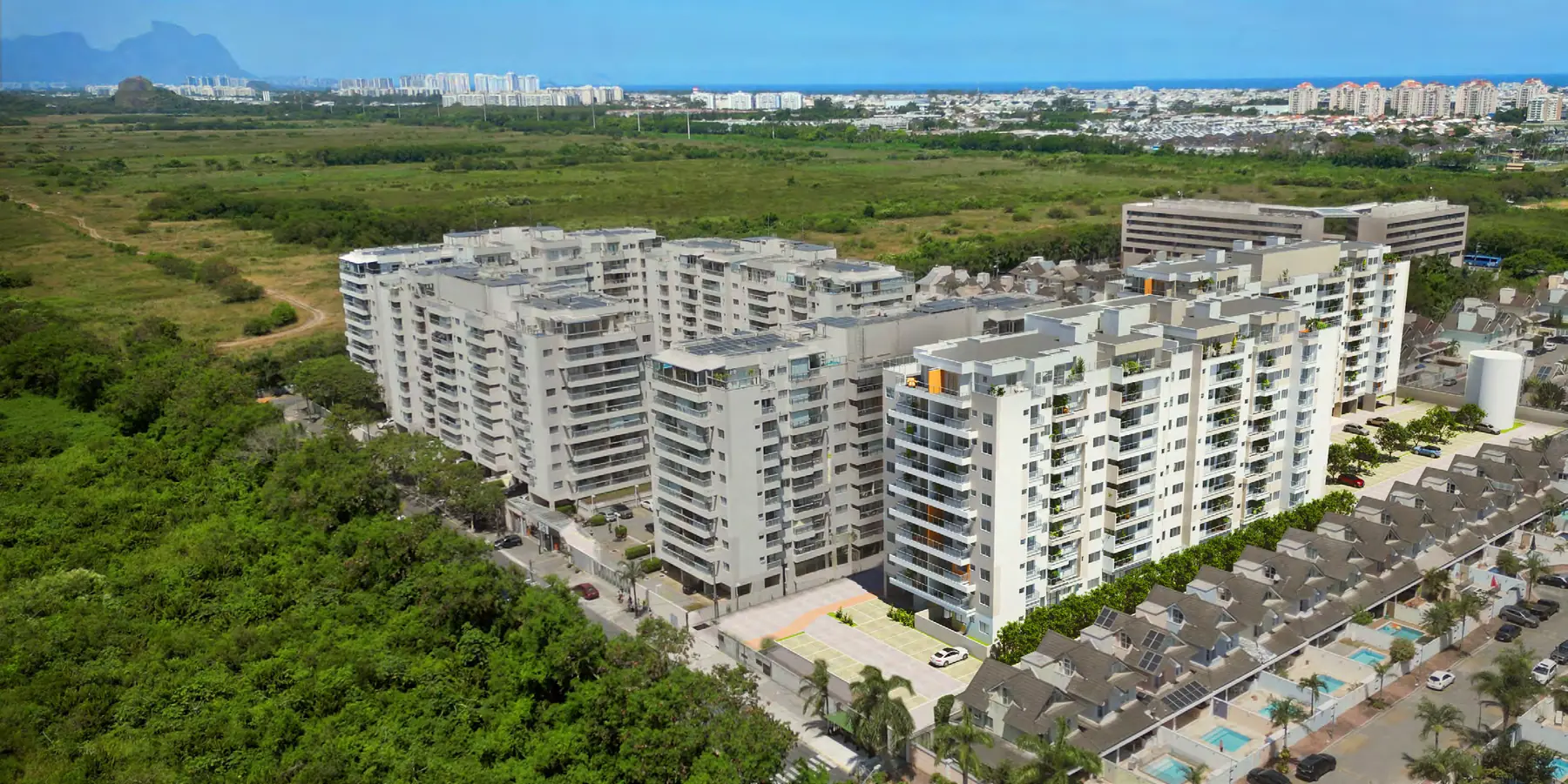 Fotomontagem aérea do RG Personal Residences e seu entorno